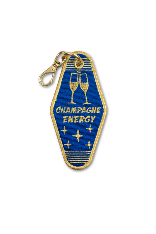 Wild Thread Studio Champagne Energy Vintage Room Key charm in cobalt blue and gold with solid brass hardware