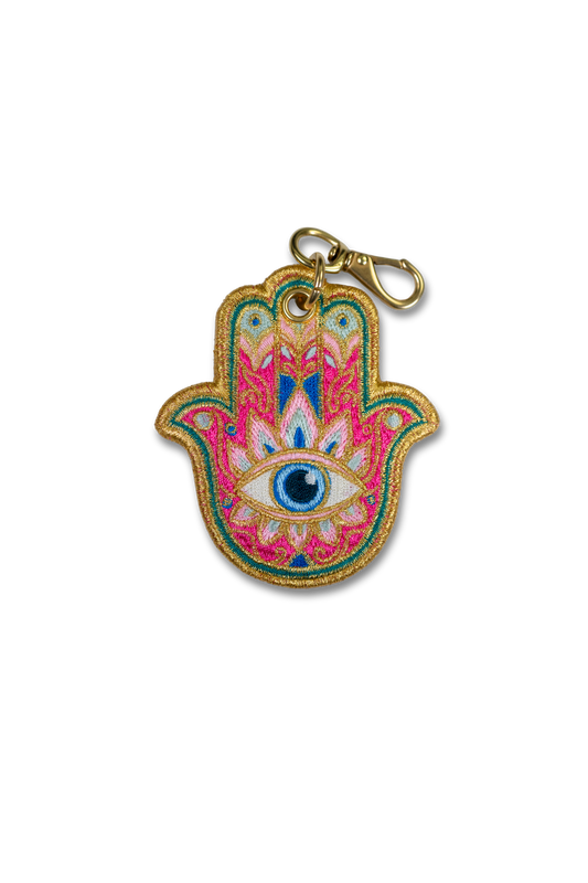 Wild Thread Studio embroidered Hamsa Hand charm in fuchsia teal and gold with evil eye center and solid brass hardware